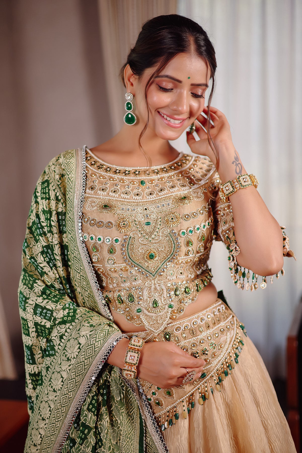 Golden Crush Tissue Lehenga with Heavily Embellished Jewel Stone Blouse with Bandhej Dupatta