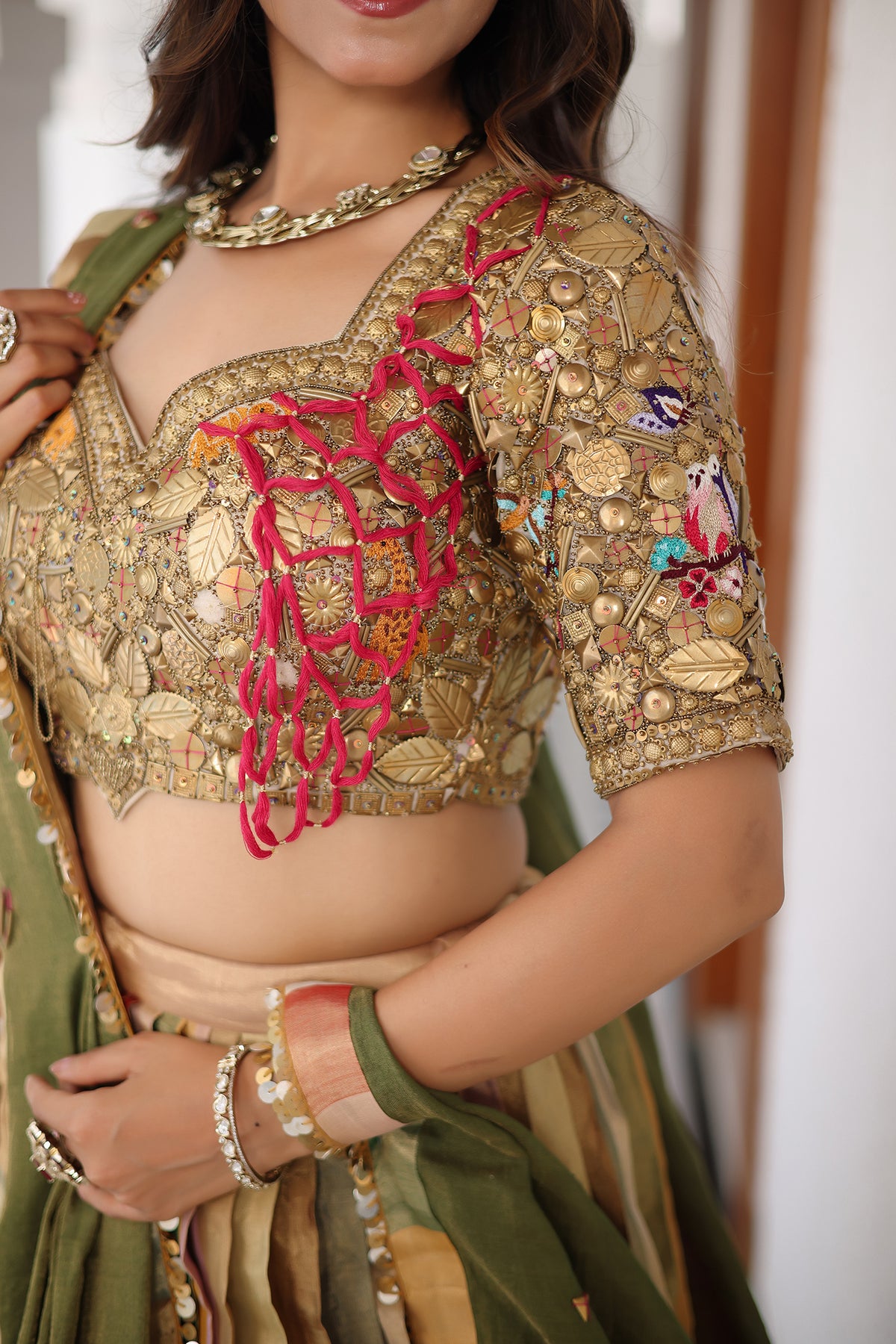 Multi Colored Tissue Silk Lehenga with Embellished Metal Work Blouse