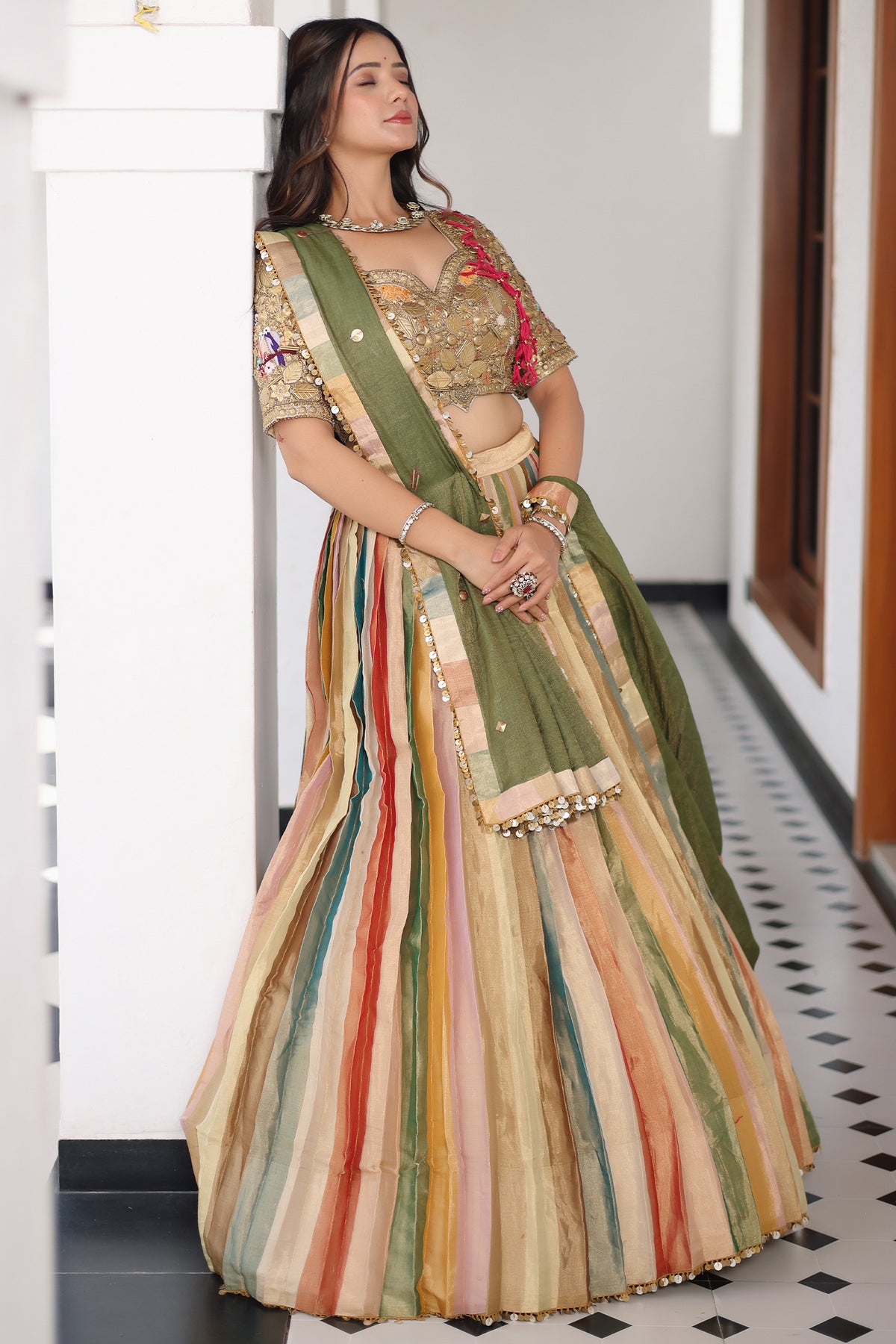 Multi Colored Tissue Silk Lehenga with Embellished Metal Work Blouse