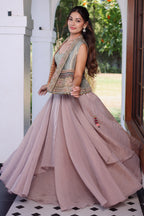 Muted Mauve Tissue Asymmetric Layered Lehenga Set With Heavily Embroidered Fusion Jacket