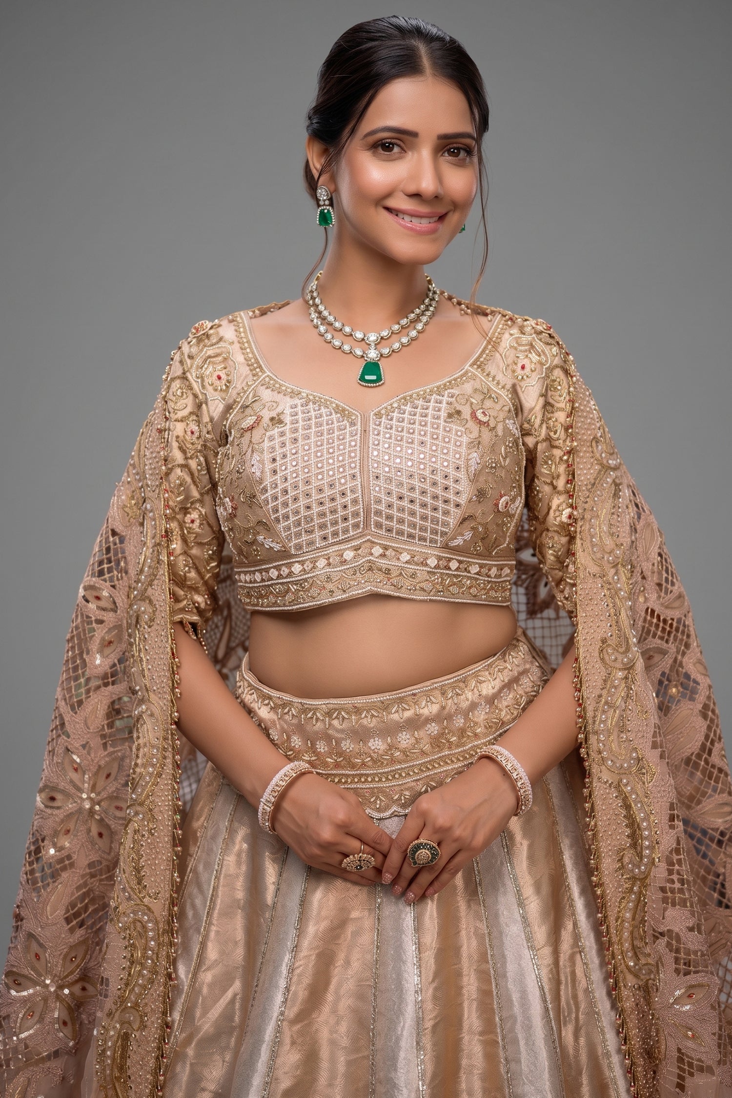 The Imperial Gold Jacquard Brocade Woven Silk Kalidar Lehenga Ensemble with Handcrafted Jewel Blouse and All-Over Cutwork Tissue Dupatta Secondary image