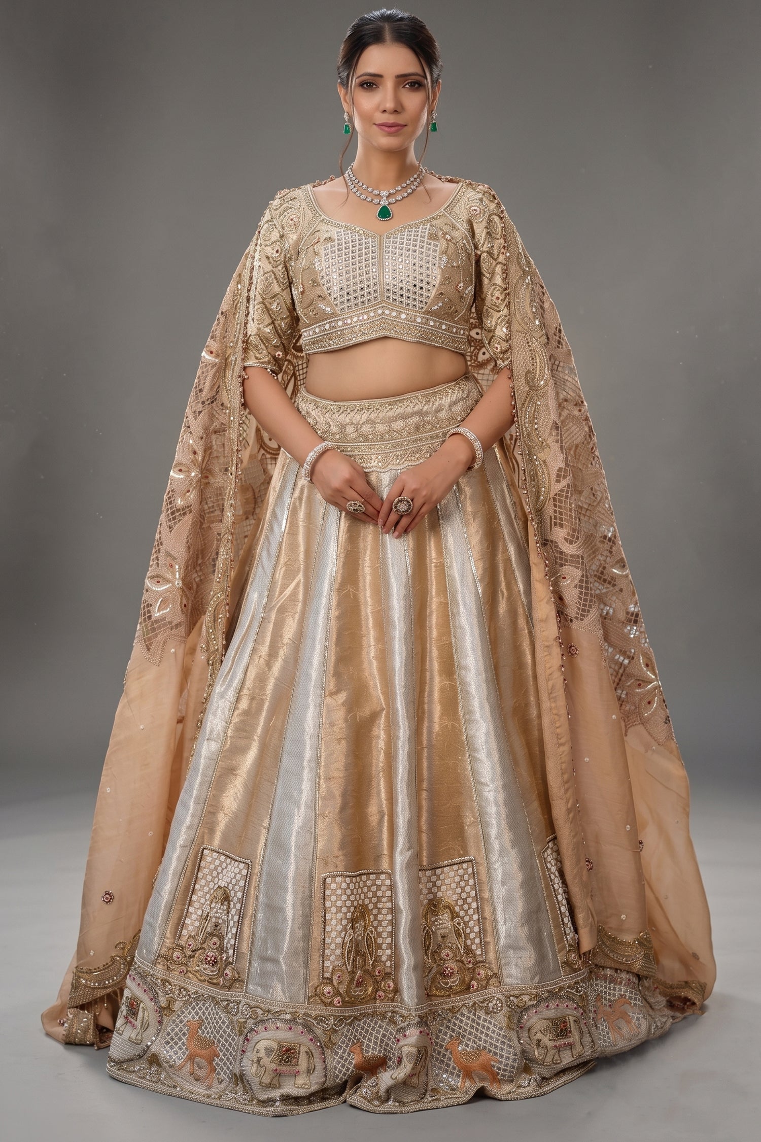 The Imperial Gold Jacquard Brocade Woven Silk Kalidar Lehenga Ensemble with Handcrafted Jewel Blouse and All-Over Cutwork Tissue Dupatta Main image