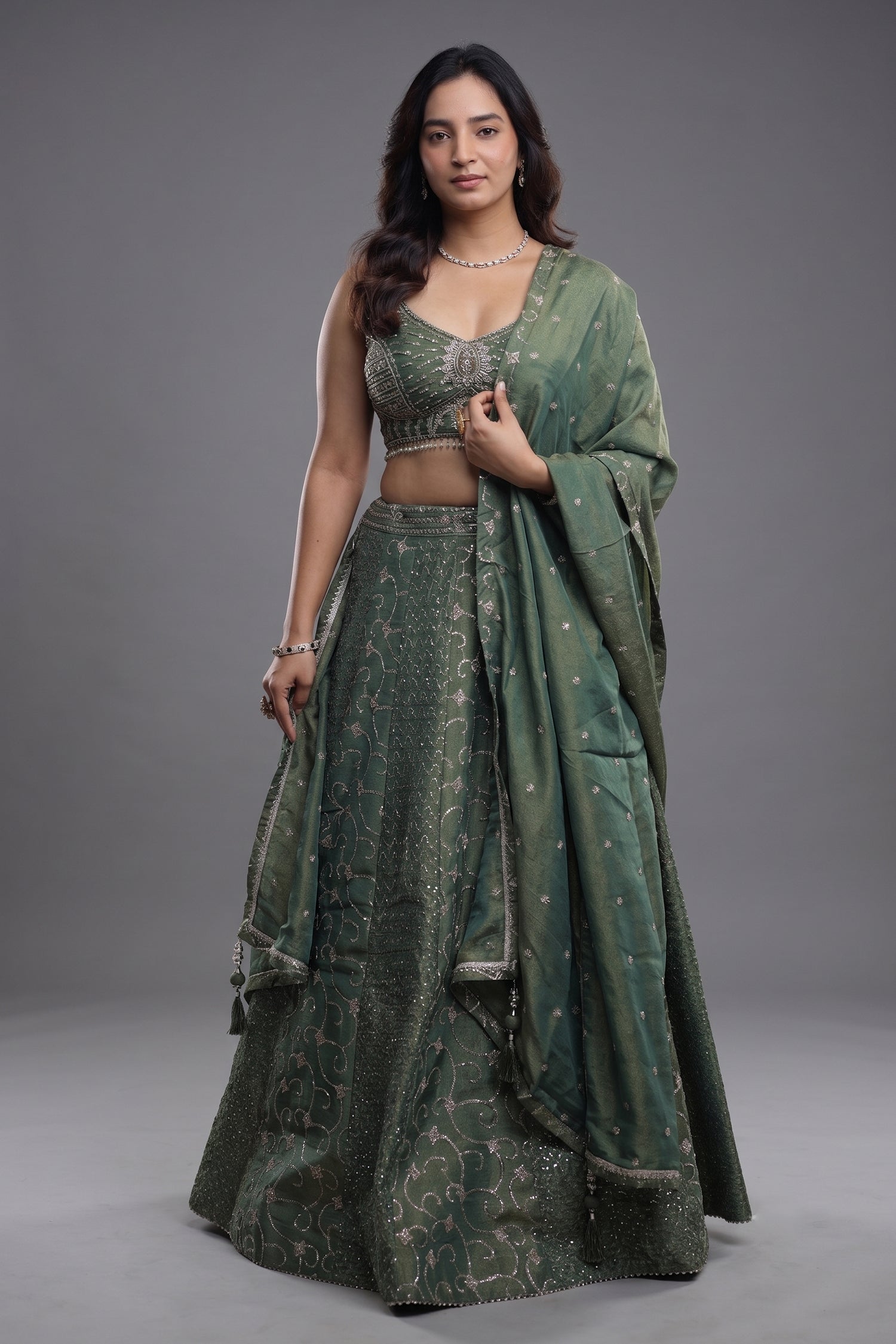 Sage Green Metallic Tissue Lehenga Set with Curvilinear Aari Sequin Work and Cutdana Blouse Main image