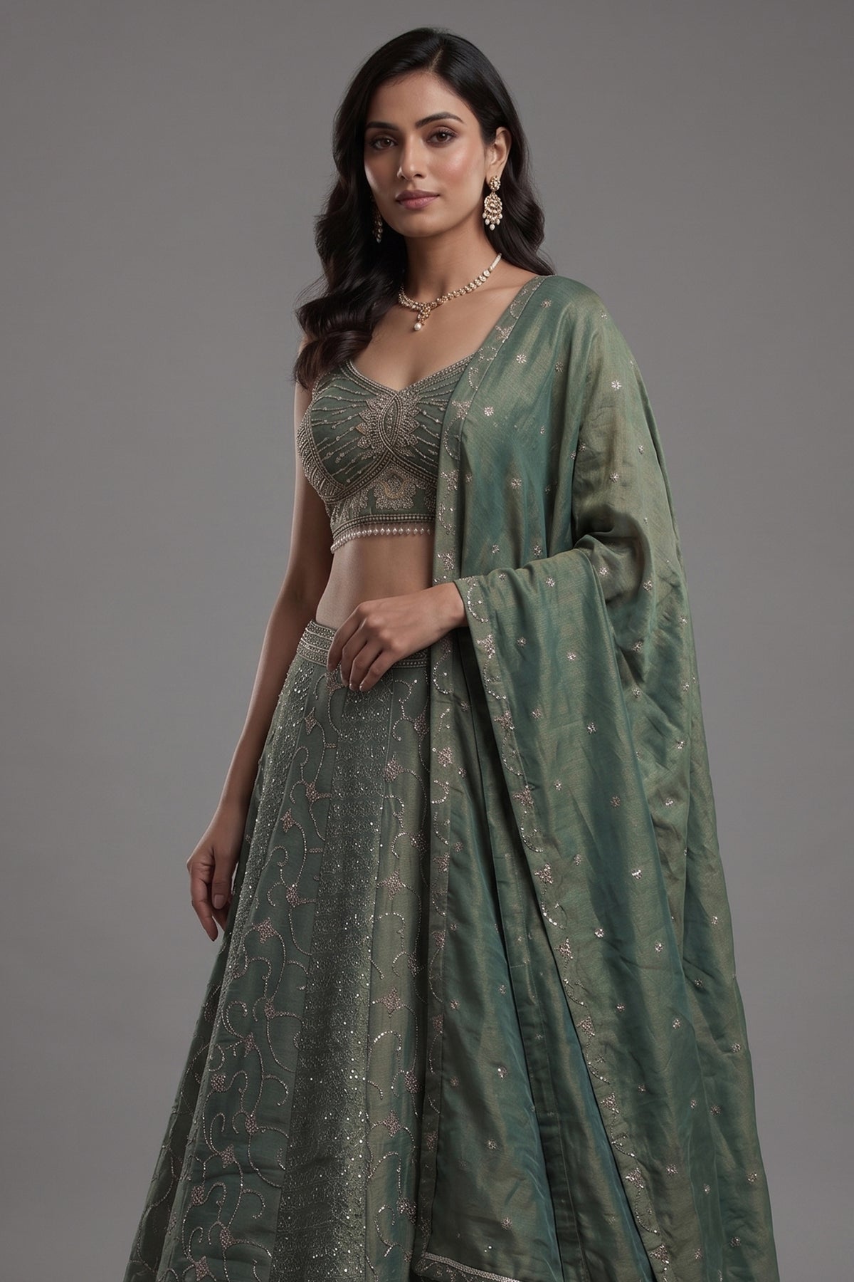 Sage Green Metallic Tissue Lehenga Set with Curvilinear Aari Sequin Work and Cutdana Blouse