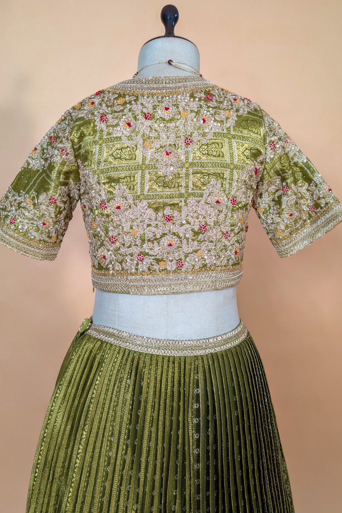 Moss Green Banarasi Silk Accordion-Pleated Lehenga Skirt with Encrusted Dabka-Zardosi Blouse