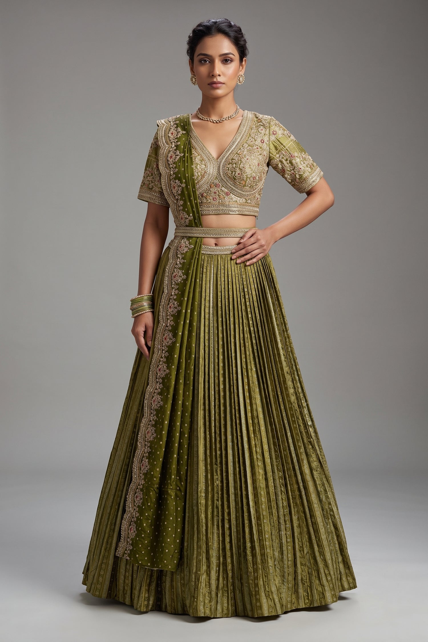 Moss Green Banarasi Silk Accordion-Pleated Lehenga Skirt with Encrusted Dabka-Zardosi Blouse Main image