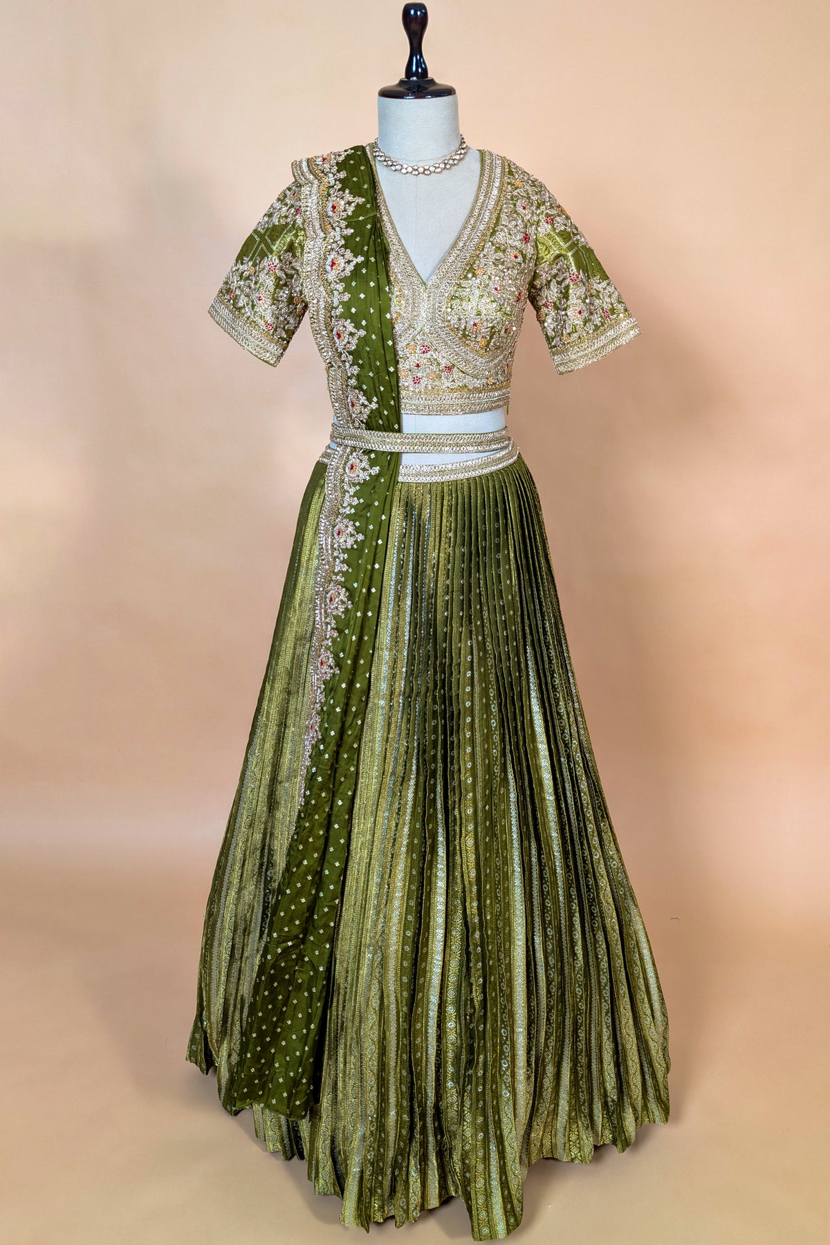 Moss Green Banarasi Silk Accordion-Pleated Lehenga Skirt with Encrusted Dabka-Zardosi Blouse