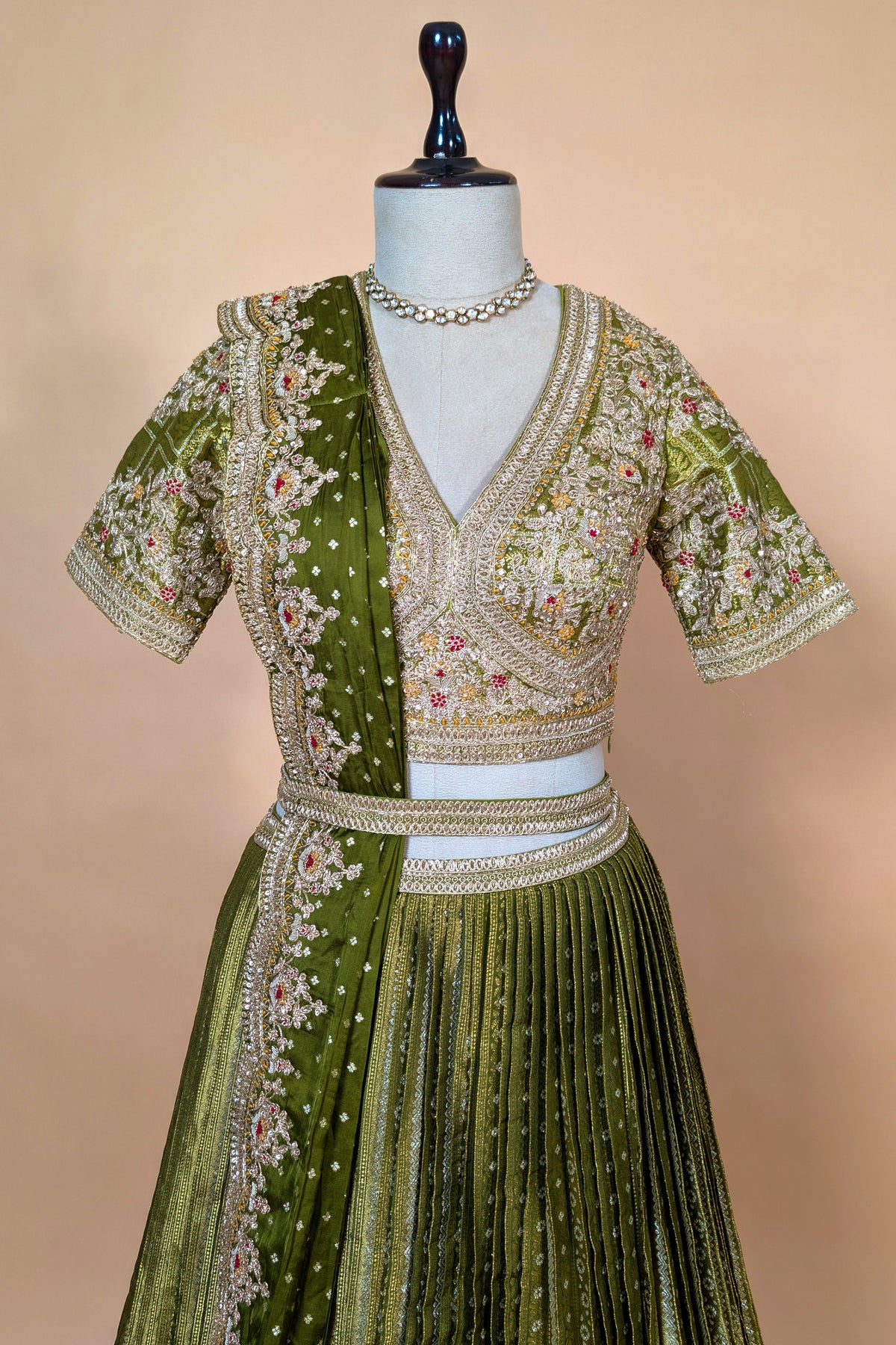 Moss Green Banarasi Silk Accordion-Pleated Lehenga Skirt with Encrusted Dabka-Zardosi Blouse