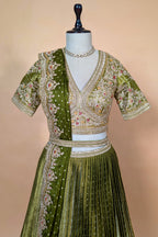 Moss Green Banarasi Silk Accordion-Pleated Lehenga Skirt with Encrusted Dabka-Zardosi Blouse