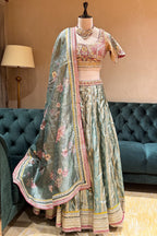 Mint Green Tissue Zari Woven Flared Lehenga with Multi-Textured Lace and Pearl Bustier