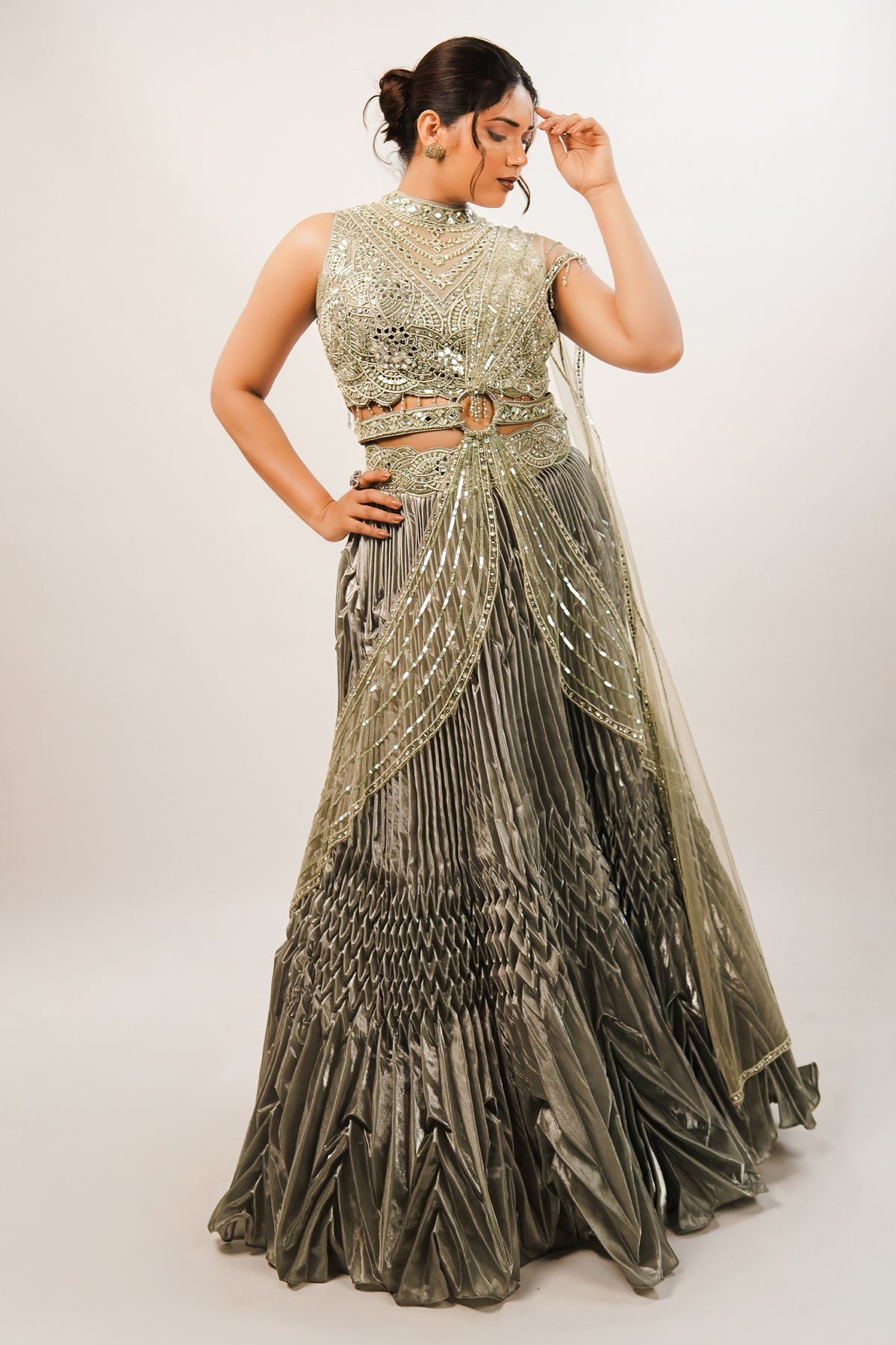 Metallic Green Smocked Satin Lehenga Set with Mirror-Embellished High-Neck Blouse