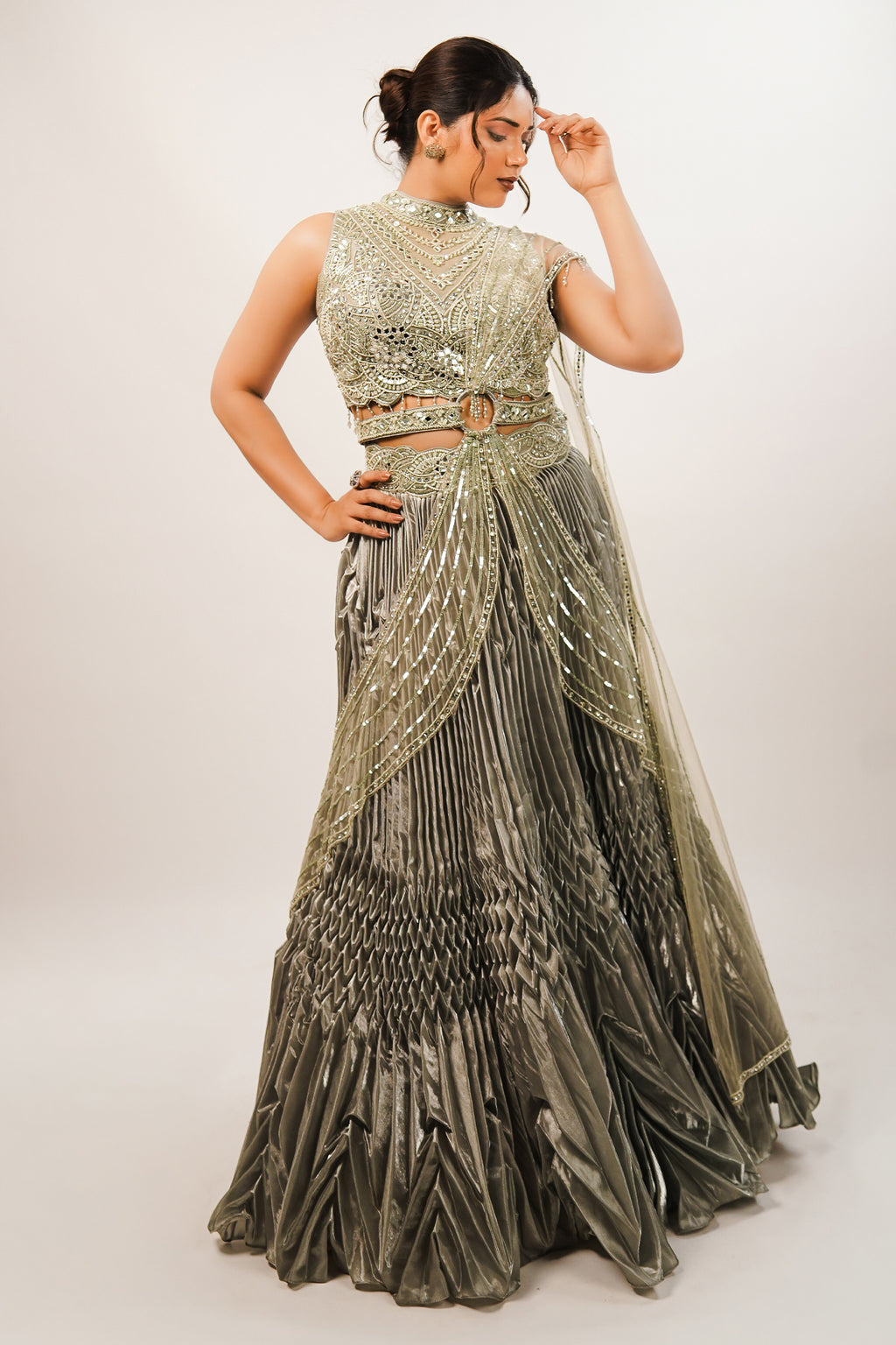 Metallic Green Smocked Satin Lehenga Set with Mirror-Embellished High-Neck Blouse