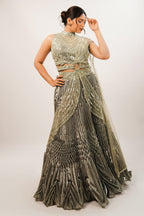Metallic Green Smocked Satin Lehenga Set with Mirror-Embellished High-Neck Blouse