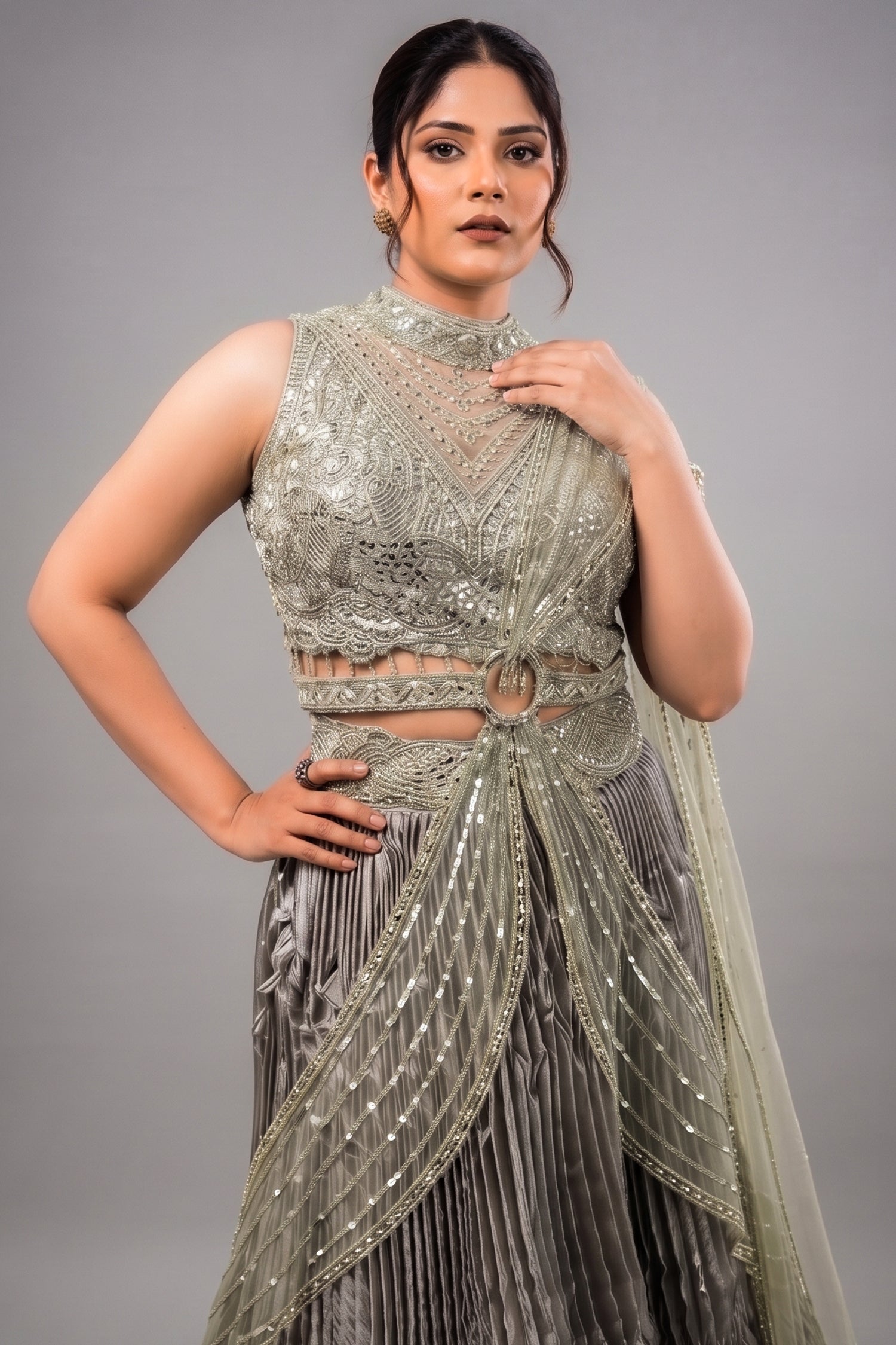 Metallic Green Smocked Satin Lehenga Set with Mirror-Embellished High-Neck Blouse Secondary image