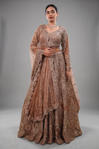 Rose Gold Beige Net Lehenga with Heavily Handcrafted Work