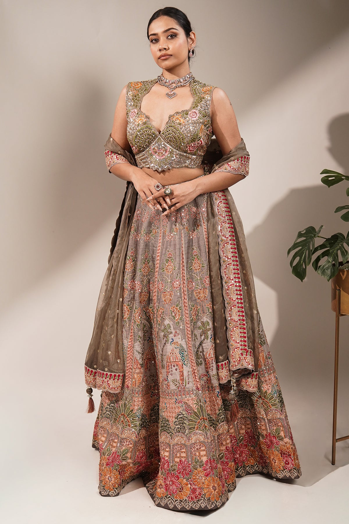 Olive Green Silk Lehenga Set featuring Cutout Halter-Neck Blouse