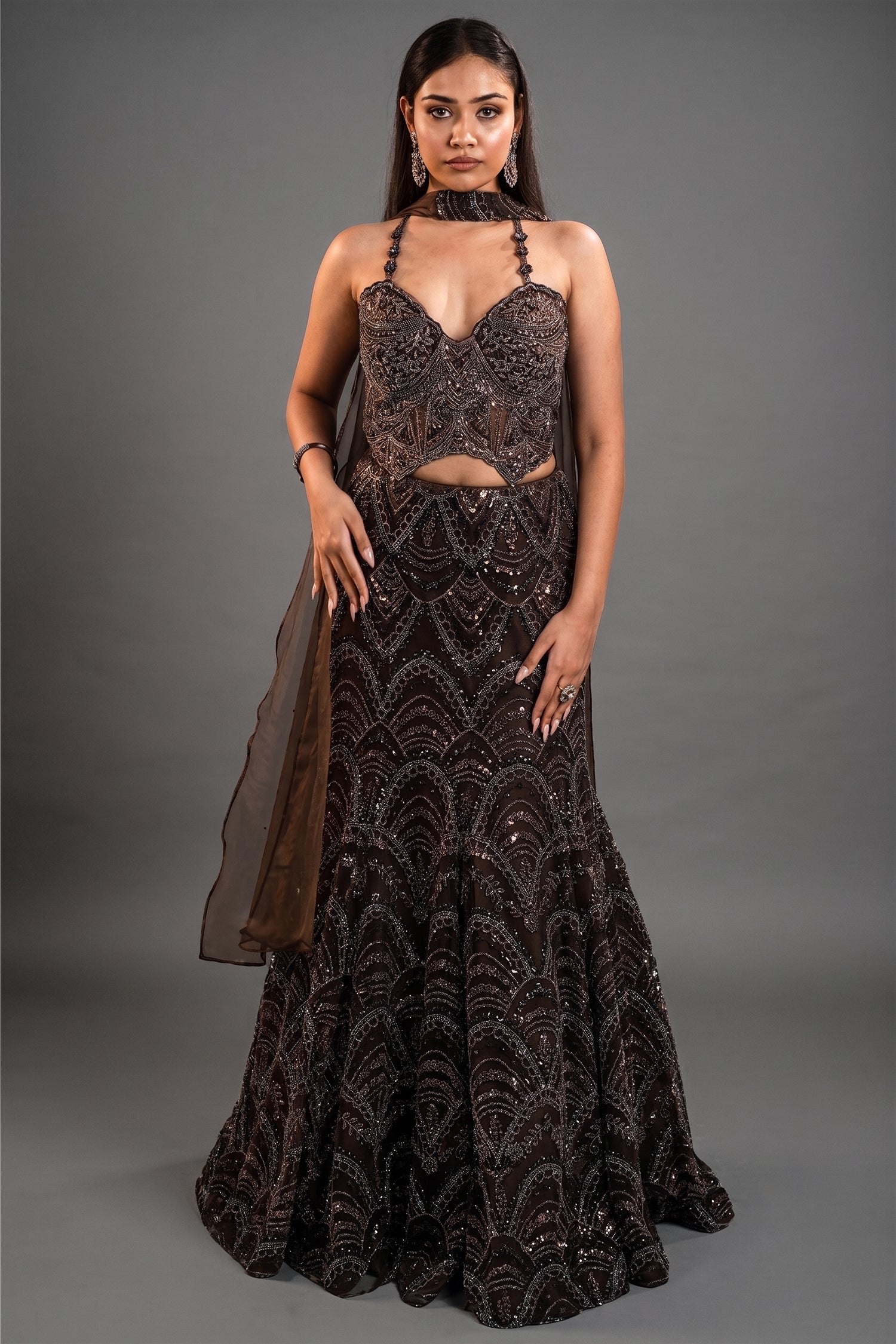 Charcoal Brown Net Lehenga Set with Wave-Patterned Cutdana and Sequin Sweetheart Bustier Main image