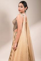 Champagne Beige Net Lehenga featuring Linear Sequin Trails and Beaded Tassel Bustier