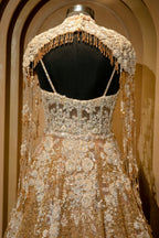 Designer Champagne Gold Net Couture Gown for grand receptions