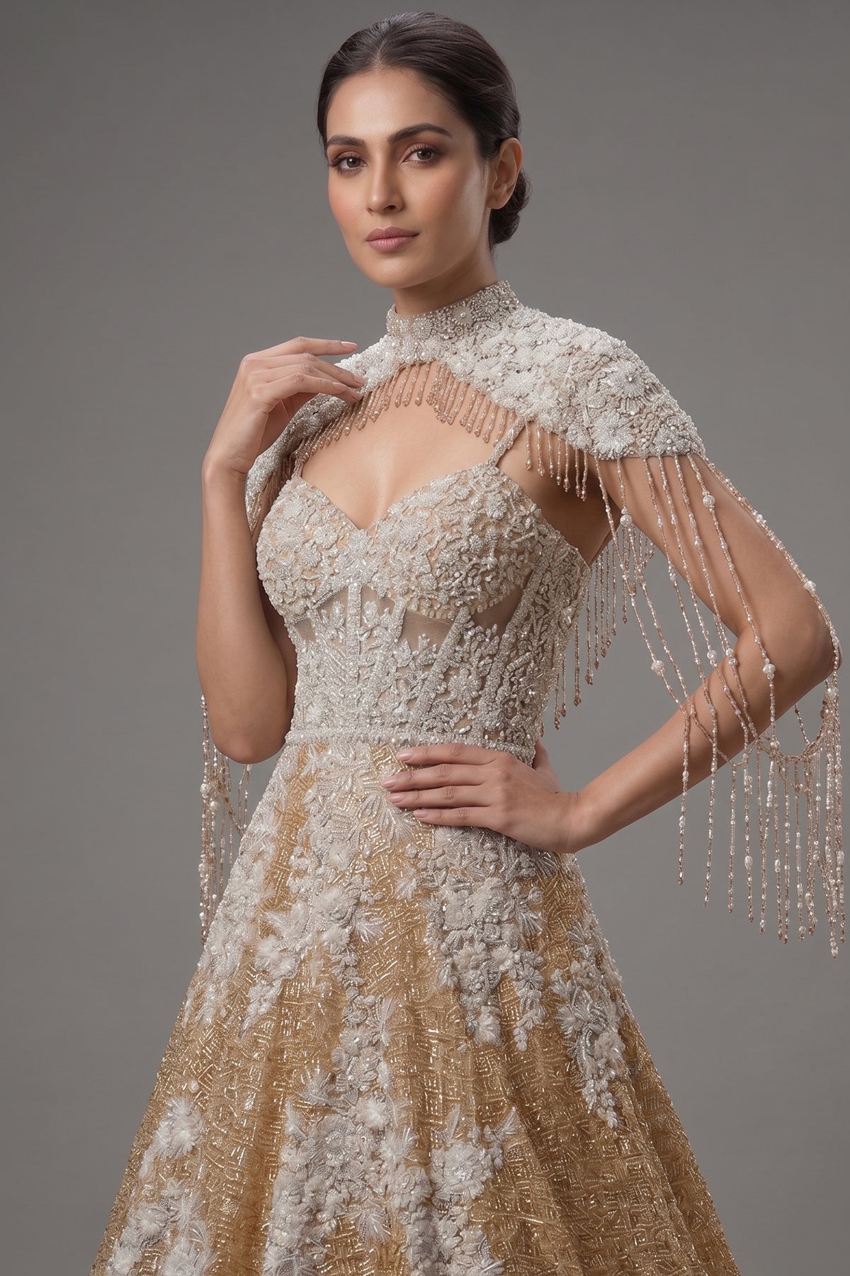 Close-up of shimmering sequins and cutdana on the Champagne Gold Net Couture Gown