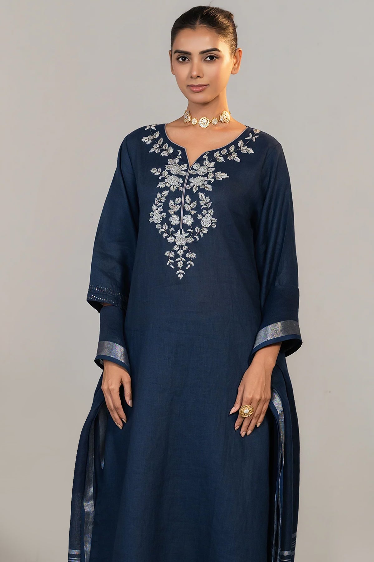 Close up of the intricate Cutdana glass bead embroidery on Prussian Blue Kurti Set