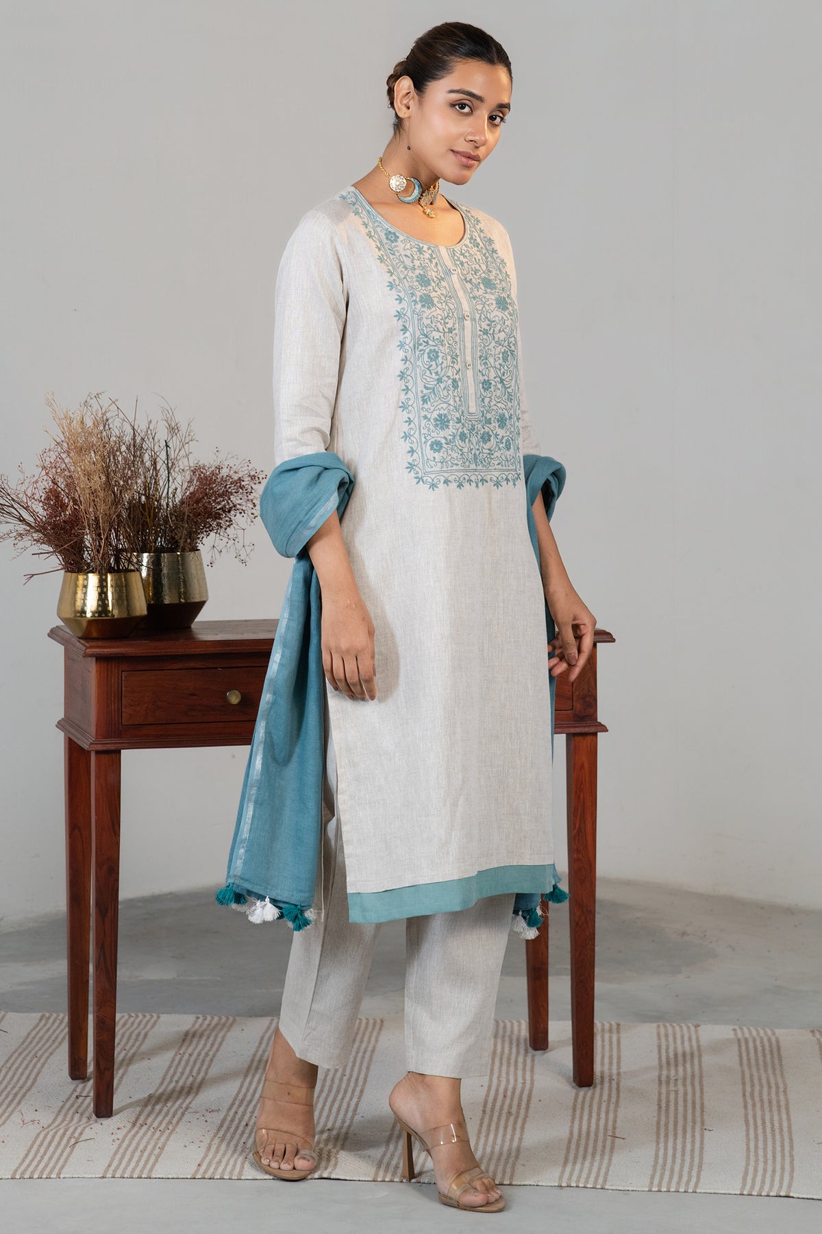 Full length elegant straight cut silhouette of Off White Linen Embroidered Kurti Set