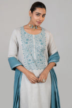 Close up of the vibrant contrast embroidery on Off White Linen Kurti Set