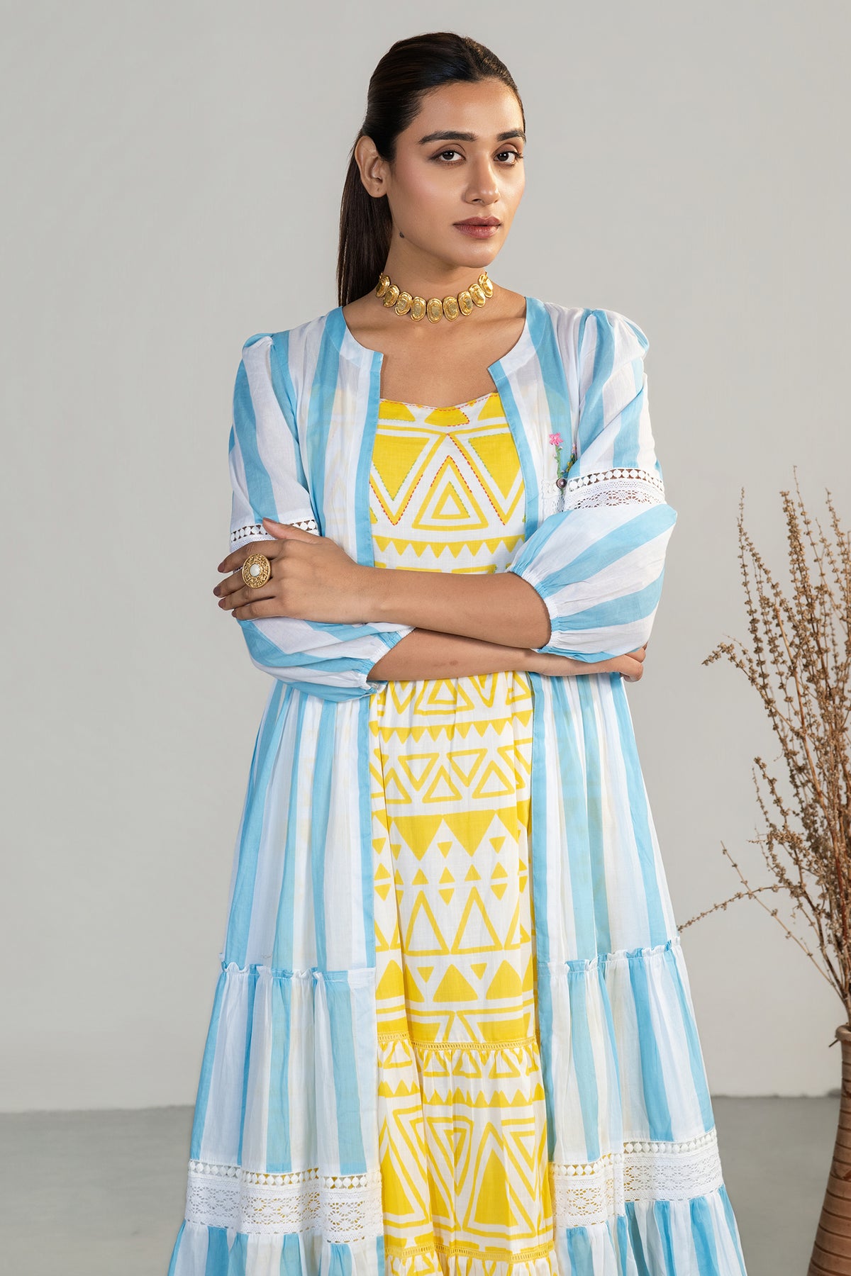 Full length bohemian style silhouette of Yellow and Blue Soft Cotton Geometric Dress