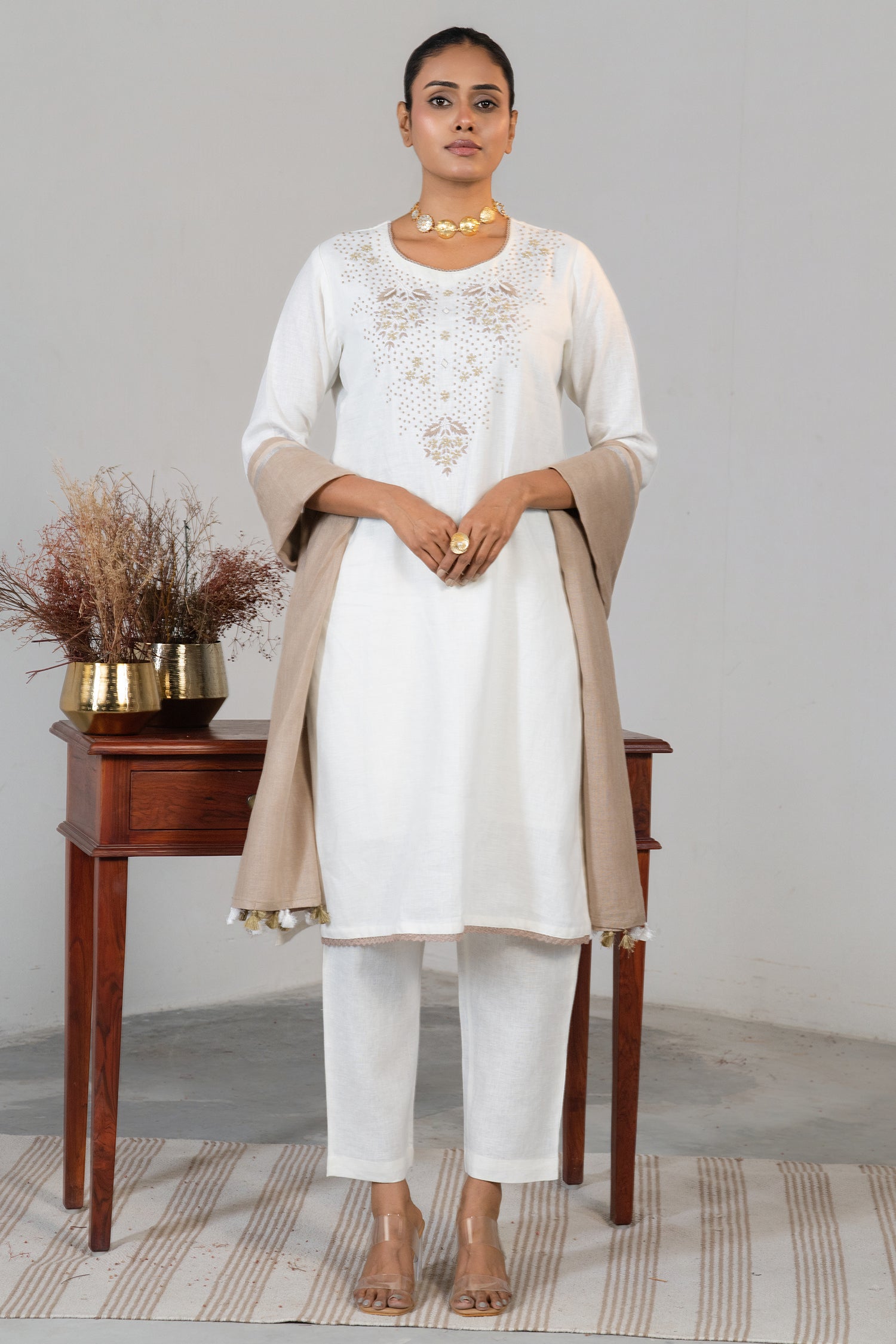 Full length elegant silhouette of contemporary Off White Linen Embroidery Kurti Set