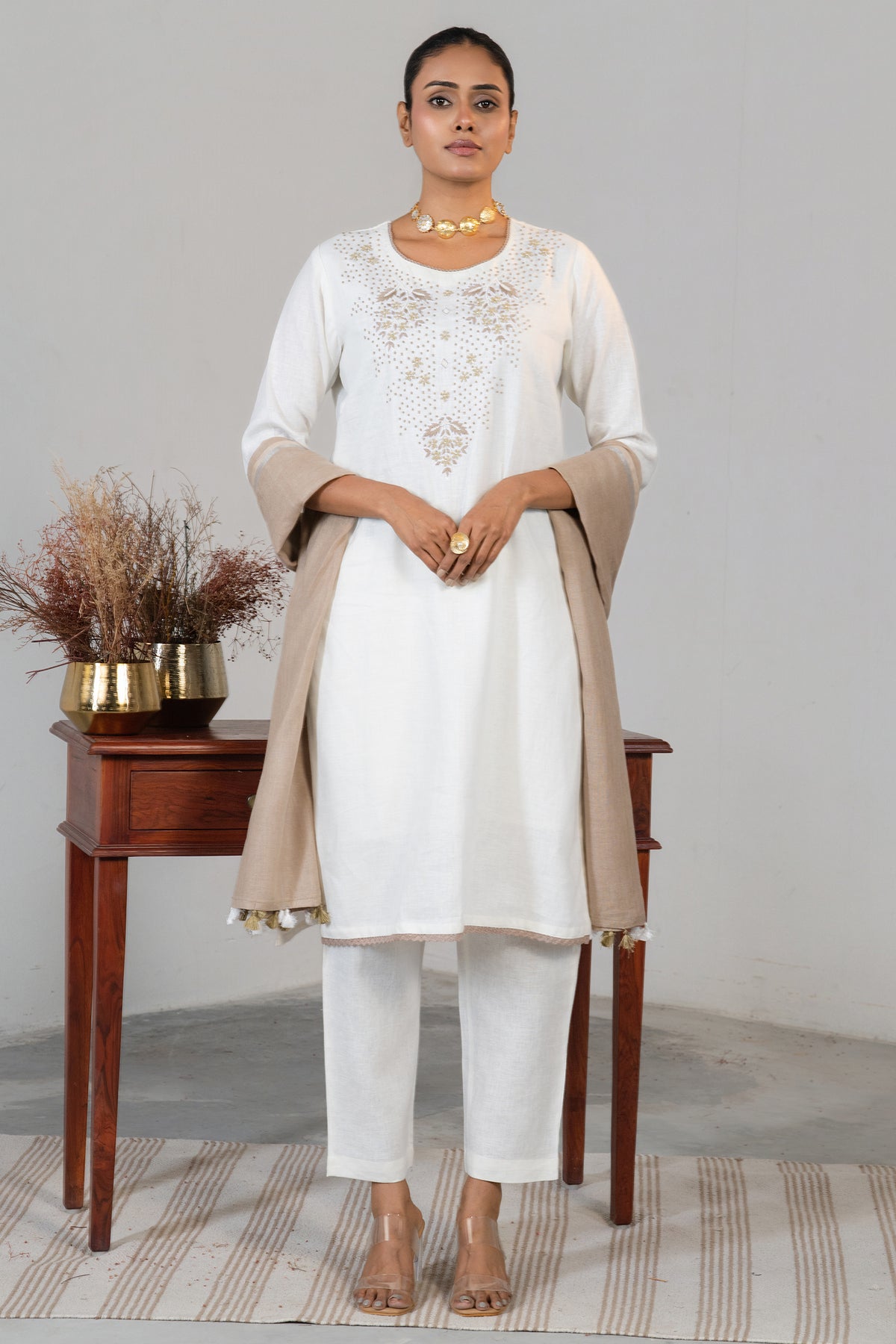 Full length elegant silhouette of contemporary Off White Linen Embroidery Kurti Set