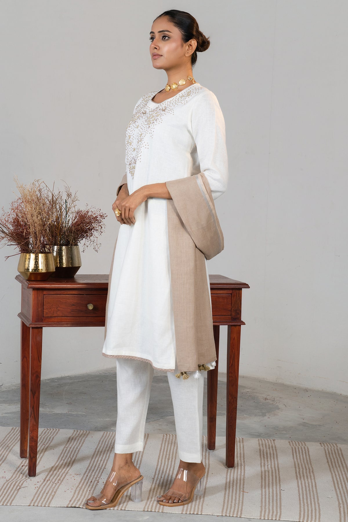 Premium linen fabric texture and styling details of Off White Beaded Kurti Set