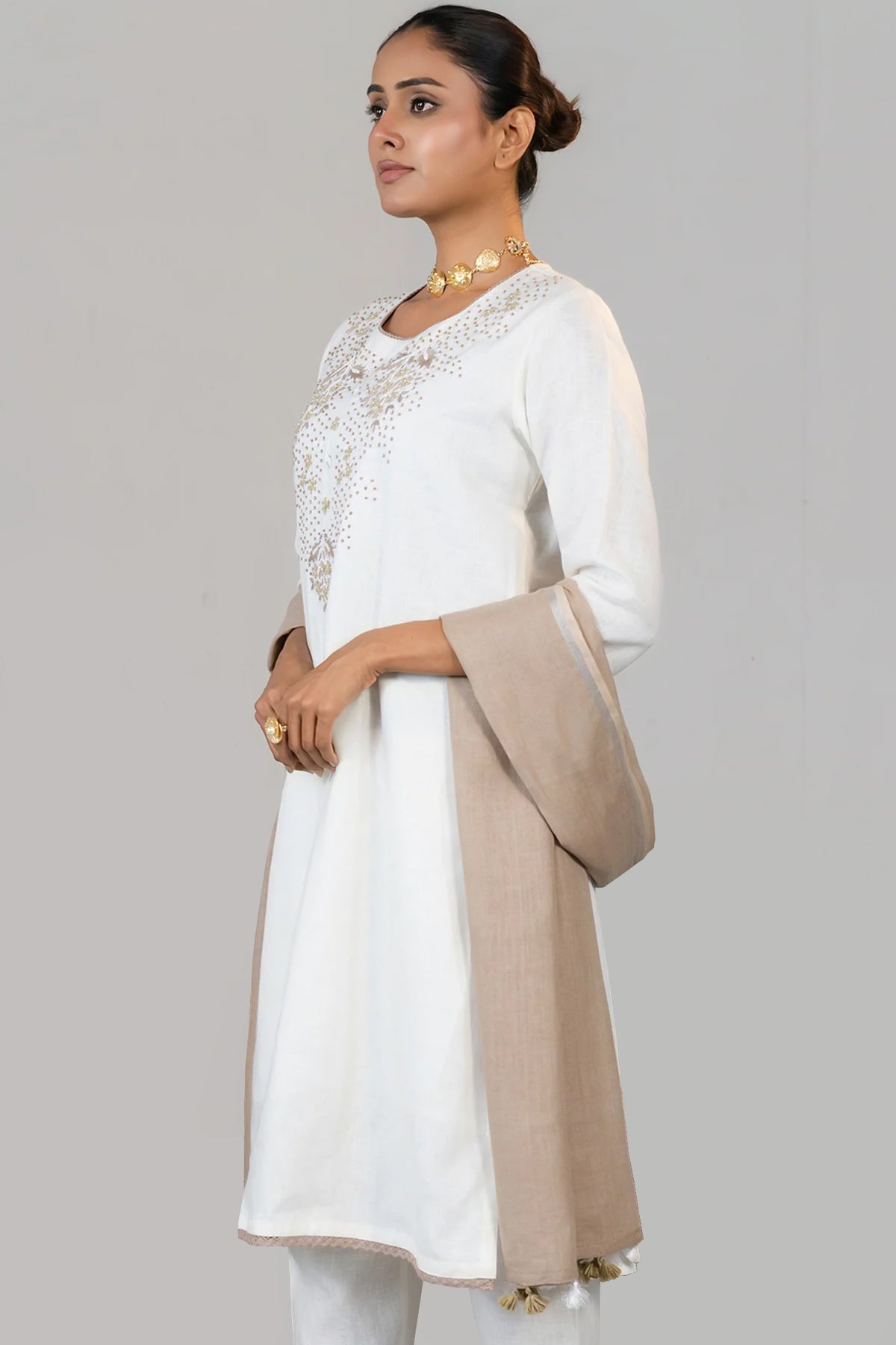 Close up of the intricate beaded needlework on Off White Linen Kurti Set