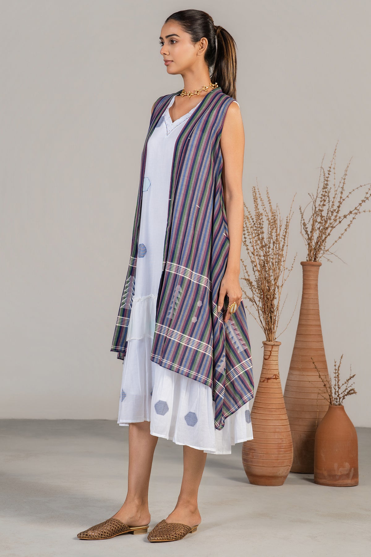 Full length elegant silhouette of contemporary Ivory White Mul Cotton Midi Layered Dress
