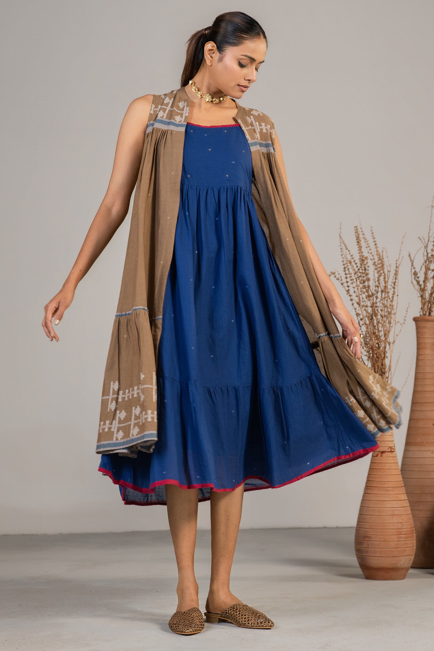 Full length elegant silhouette of Indigo Blue Mul Cotton Midi Dress