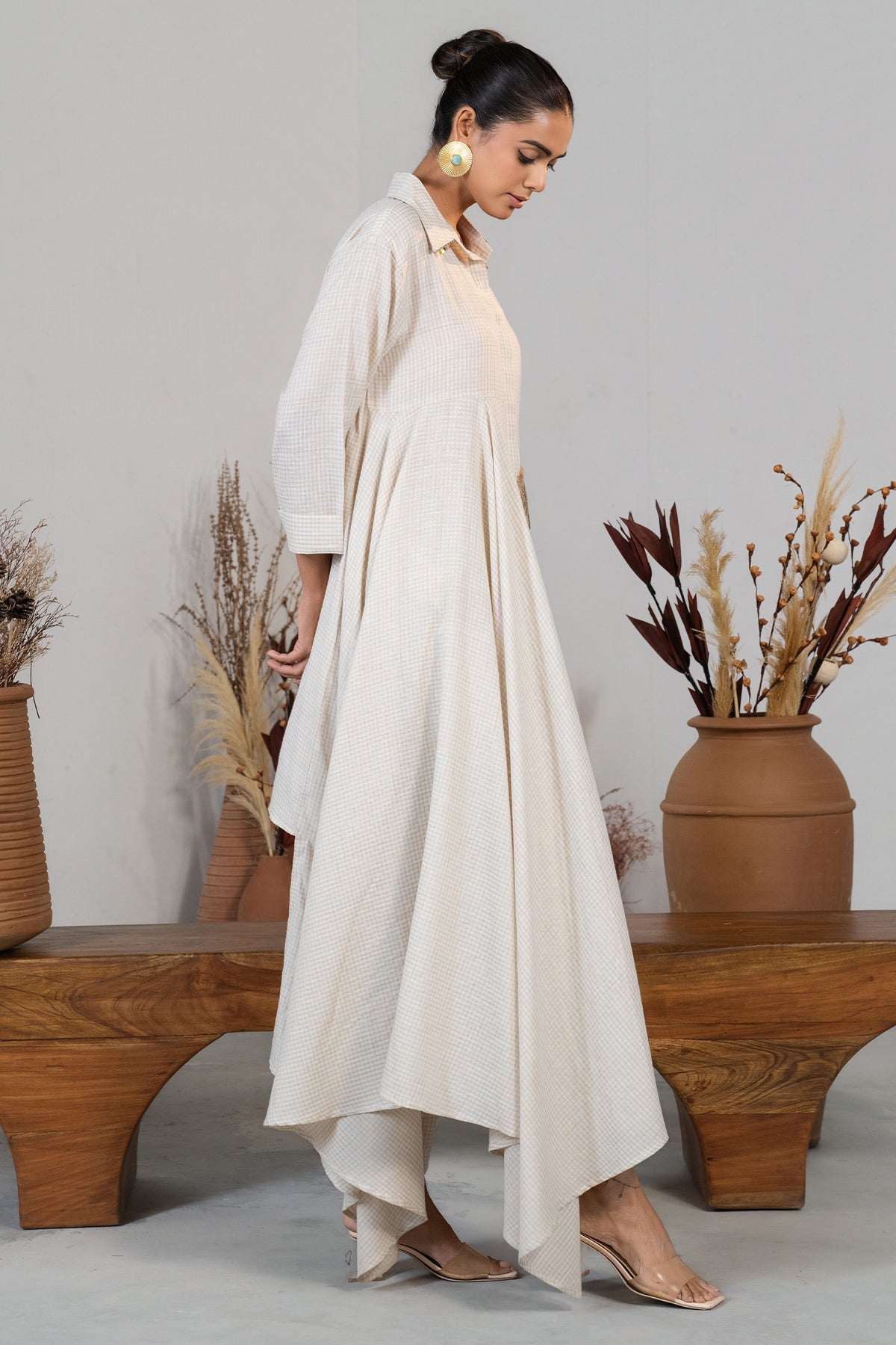 Lapel collar and styling details of the contemporary Ivory White Jute Asymmetric Co-Ord Set