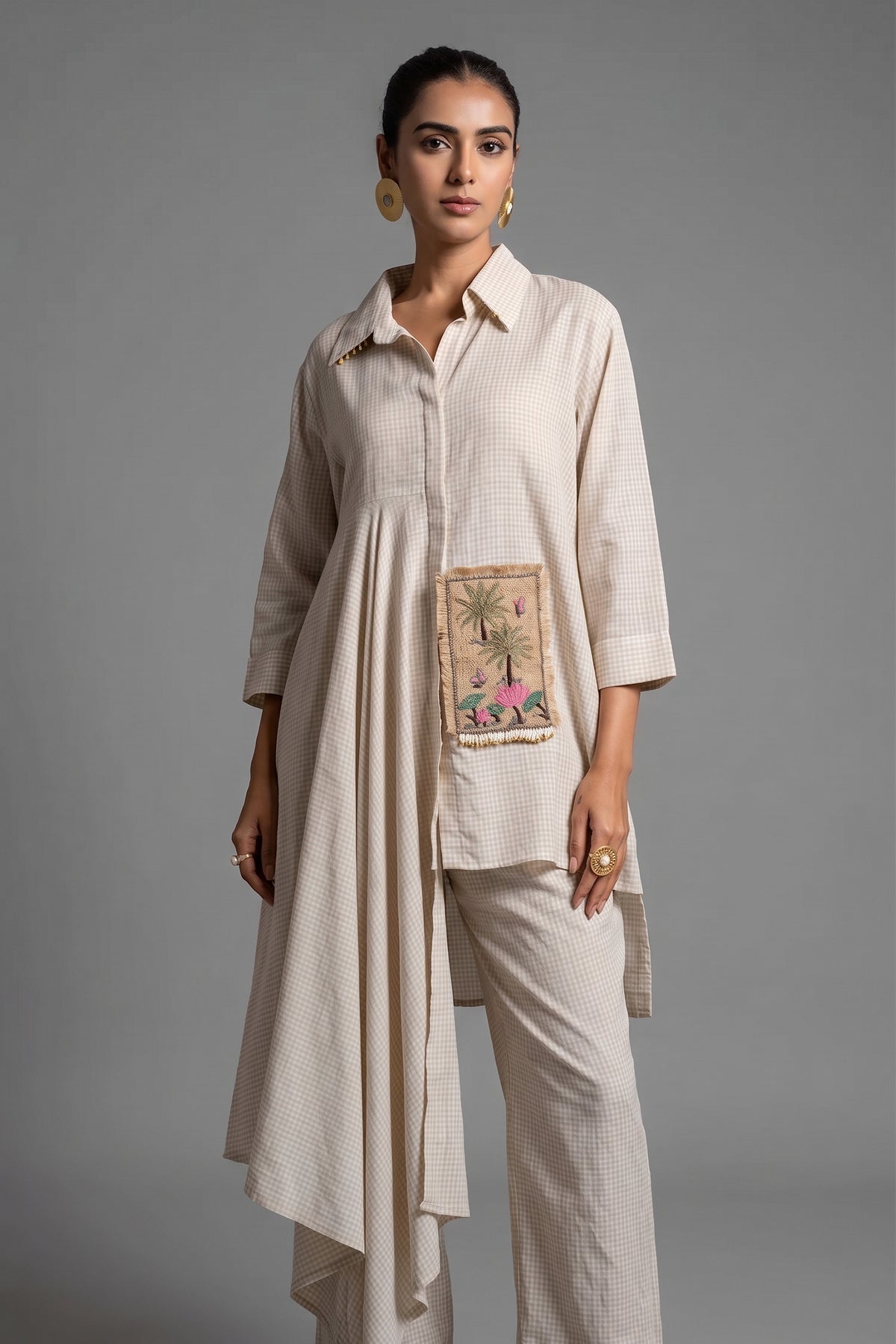 Close up of the premium jute texture and asymmetric hem on Ivory White Jute Co-Ord Set