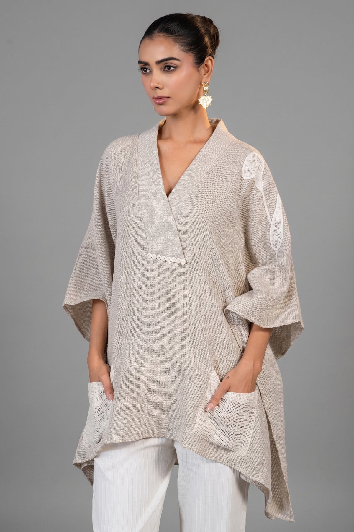 Close up of the intricate needlework on Ivory Jute Embroidered Kaftan Set