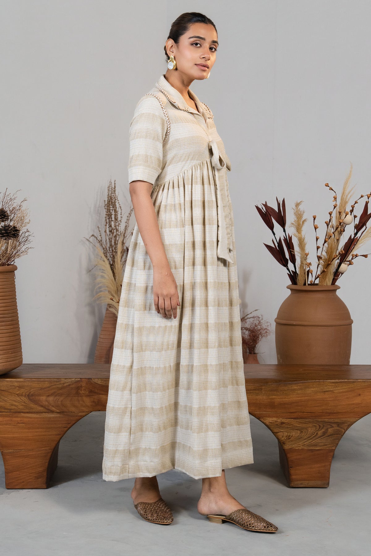 Intricate handcrafted needlework details on Ivory Jute Embroidered Tie Up Dress
