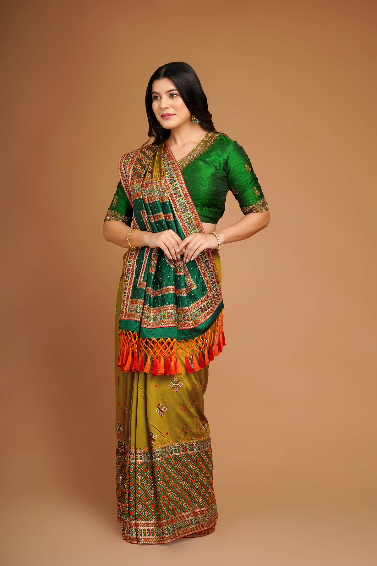 Olive Green Silk Broad Embroidered Border Saree with Tassels