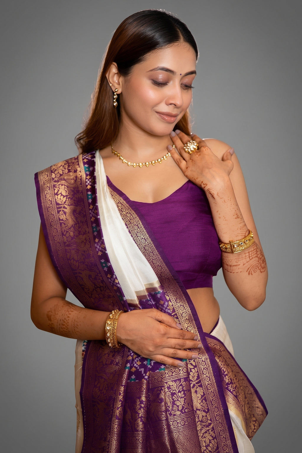 Off White Dola Silk Saree with Contrast Patola Border