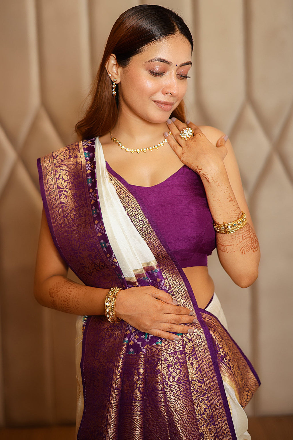 Off White Dola Silk Saree with Contrast Patola Border