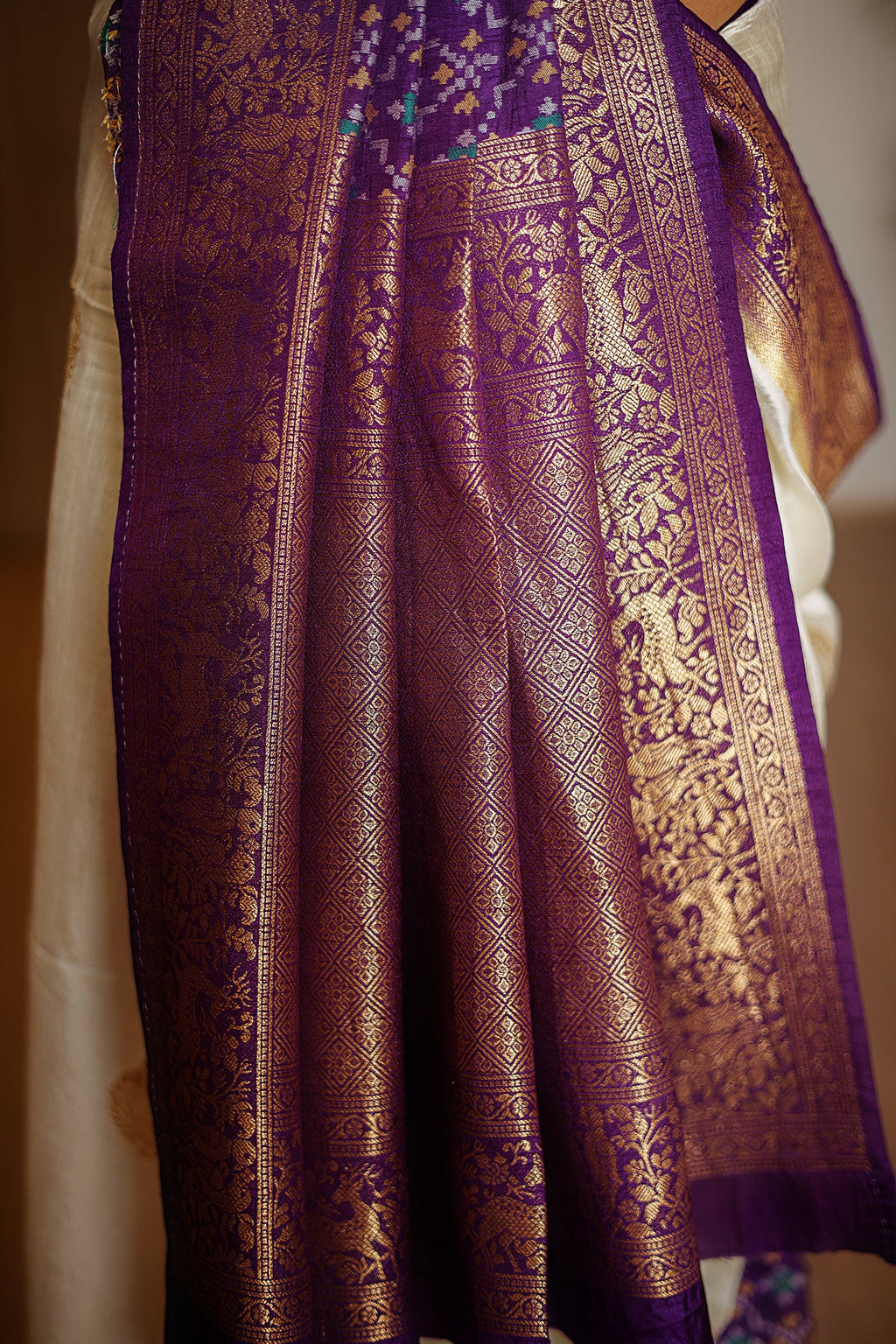 Off White Dola Silk Saree with Contrast Patola Border
