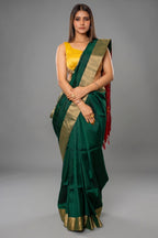Bottle Green Raw Silk Plain Saree with Contrast Patola Pallu - green silk saree patola