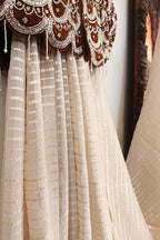 Cream Soft Organza Silk Weaving Stripe Saree with Poncho Blouse and Cutdana Work Scallop Border - cream silk saree