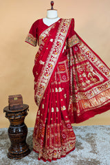 Maroon Gaji Silk Traditional Bandhej Checks Gharchola Saree with Embroidery and Peacock Motif