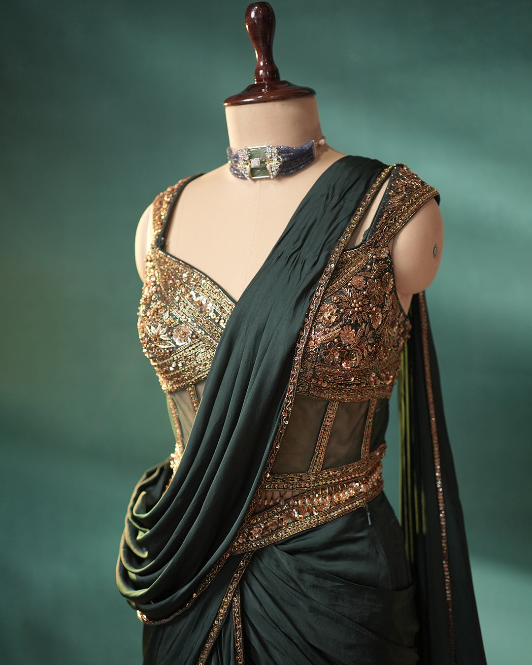 Bottle Green Crepe Satin Silk Pre Draped Lehenga Style Saree with Embellished Corset - green silk saree
