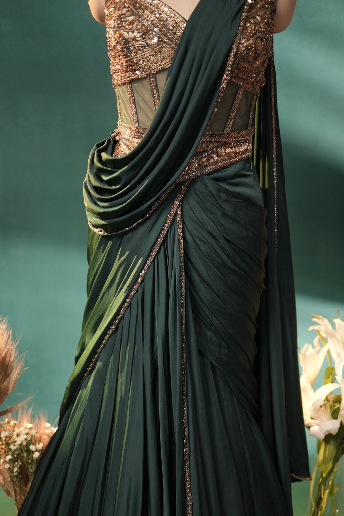Bottle Green Crepe Satin Silk Pre Draped Lehenga Style Saree with Embellished Corset - green silk saree