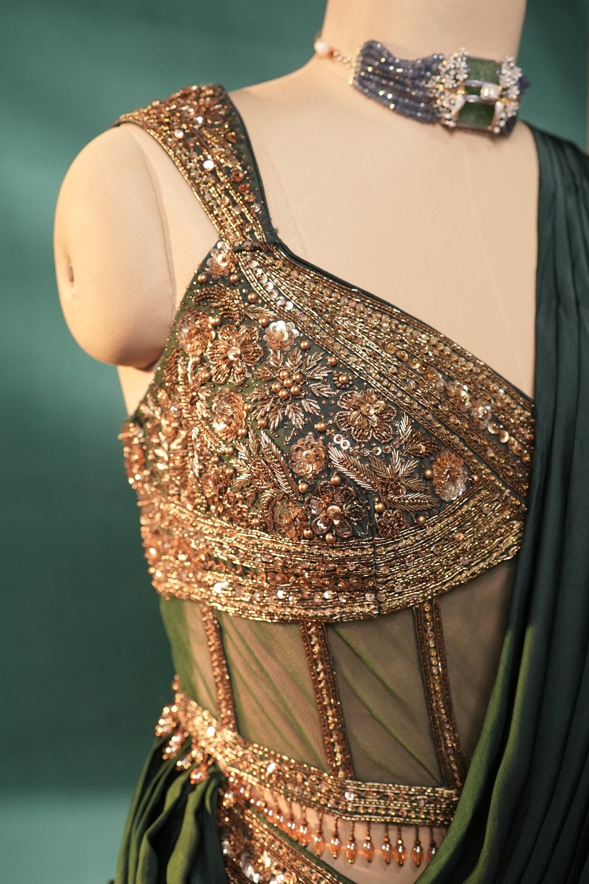 Bottle Green Crepe Satin Silk Pre Draped Lehenga Style Saree with Embellished Corset - green silk saree