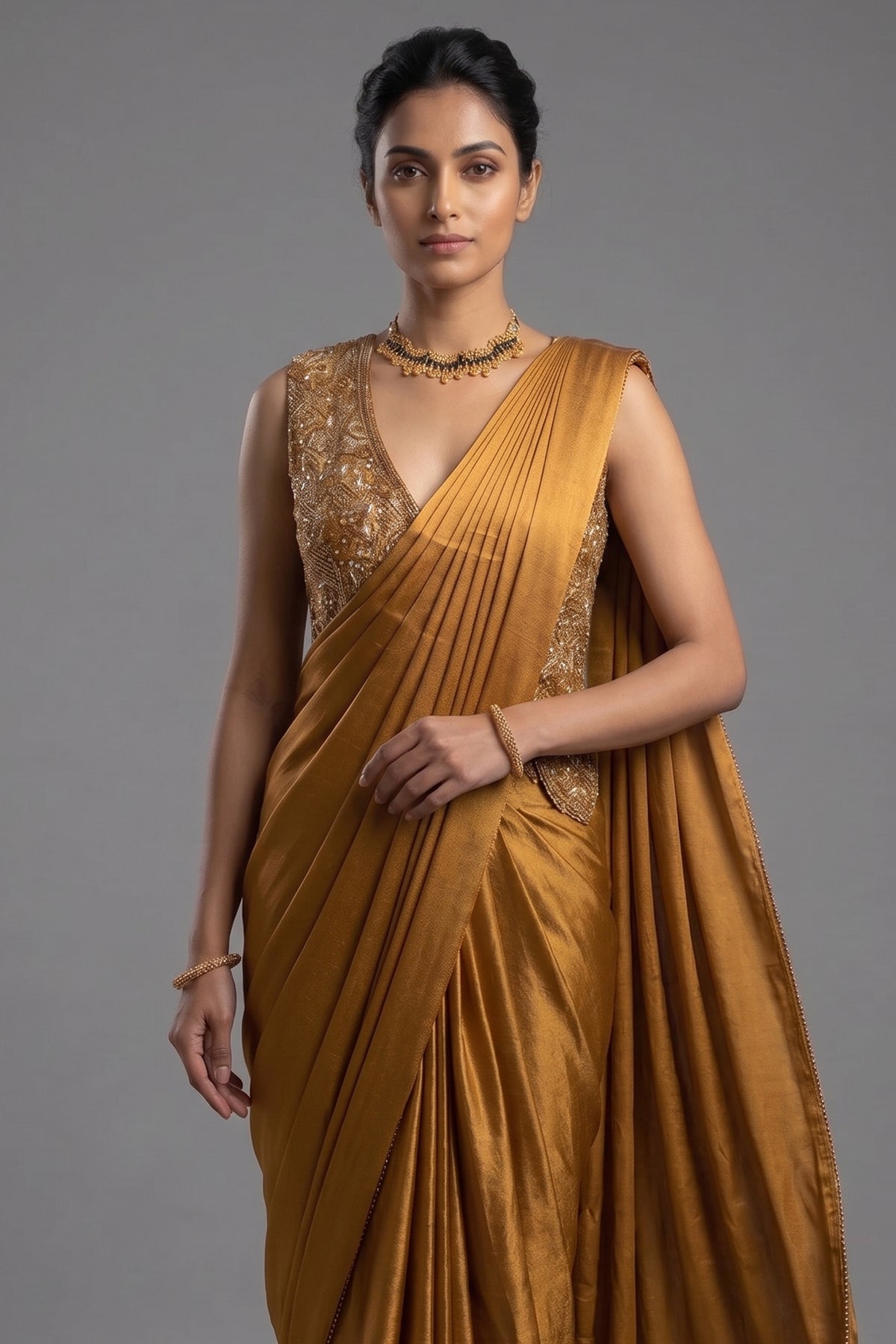 Golden Satin Silk Pre Draped Saree with Cutdana and Pearl Worked Jacket - gold silk saree