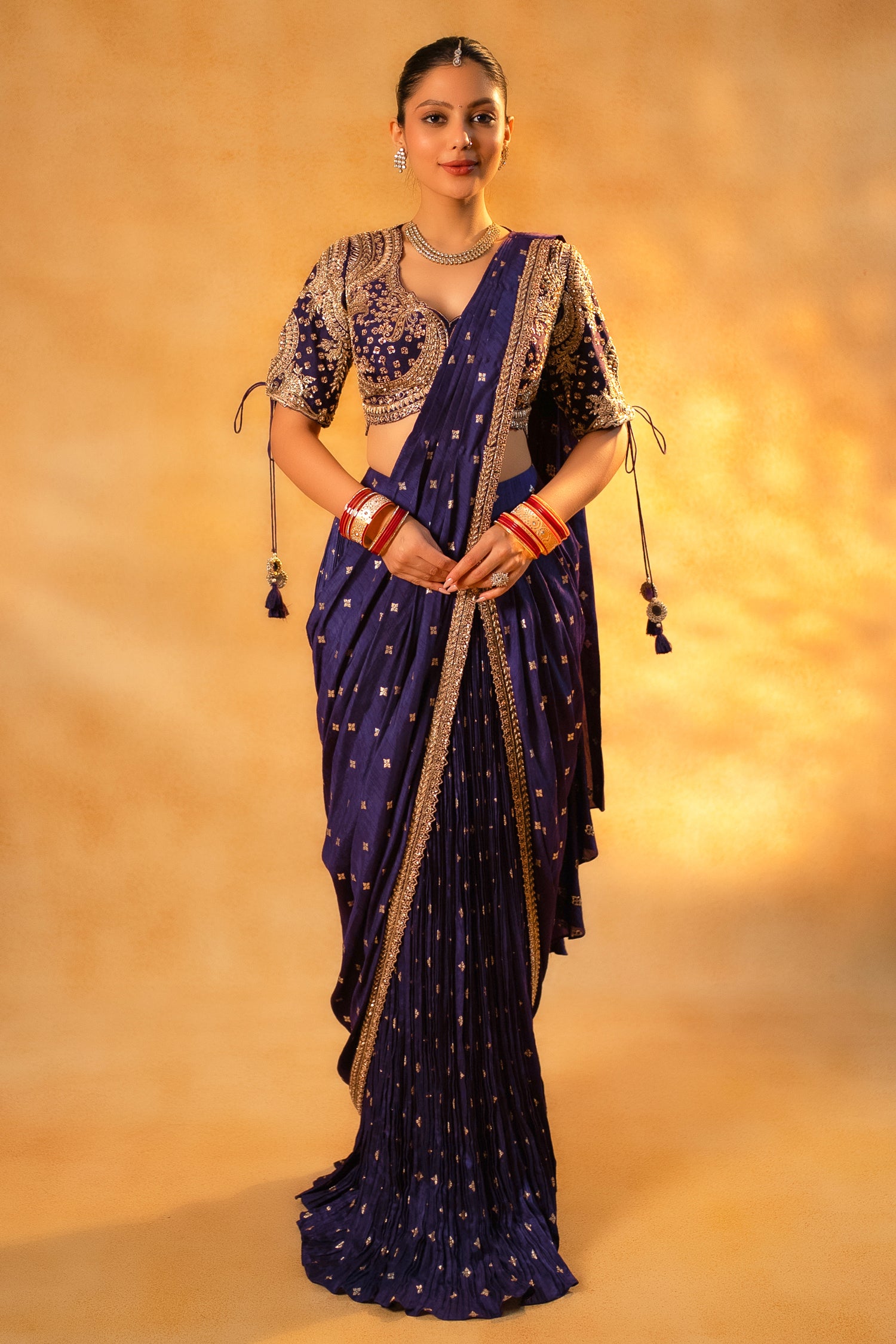 Imperial Plum Purple Raw Silk Saree featuring architectural micro-pleats